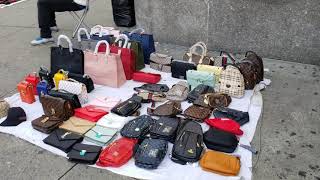 Vendors selling imitation designer bags on Canal Street in New York City. Part 2