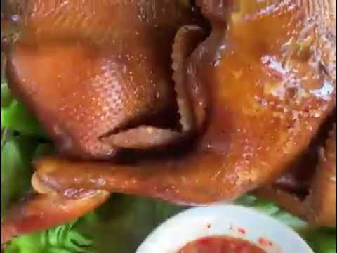 Video: Yuav Ua Li Cas Noj Peking Duck