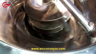 Arch-breaker device to break the caking and bridging materials