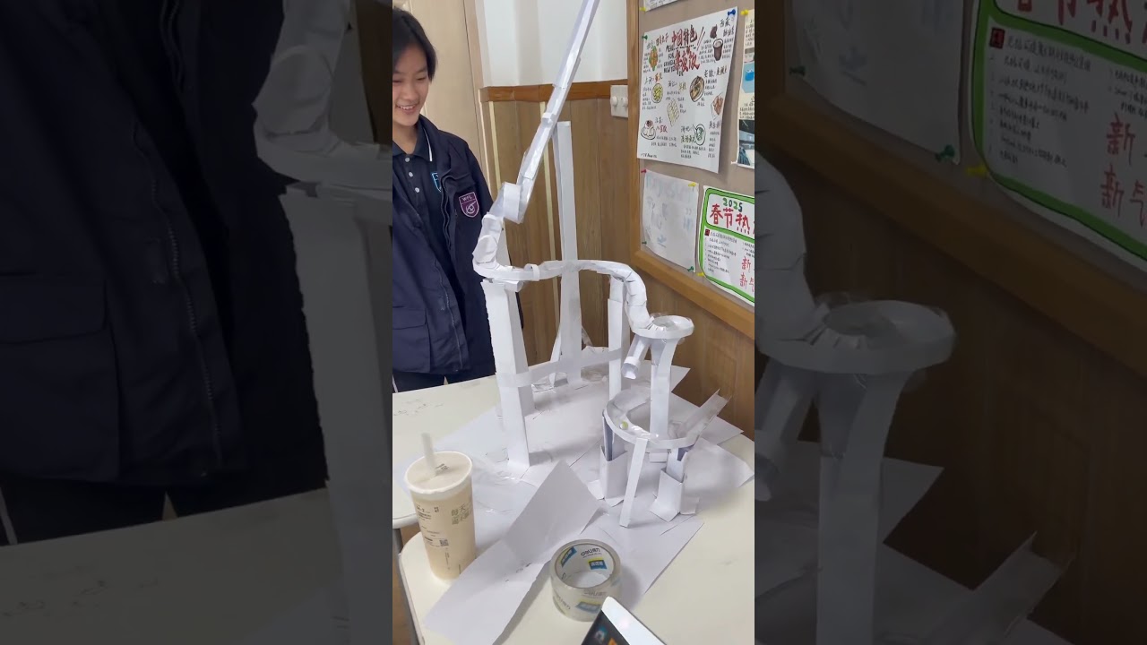 Chinese students preparing maths project 