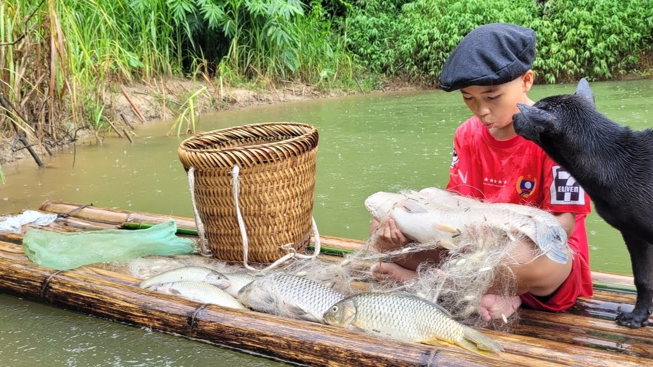 The boy cast a net in a large stream and caught all the big fish ...
