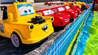 Disney Pixar Cars falling into deep pool, Lightning McQueen, Tow Mater, Mack, Sally, Francesco