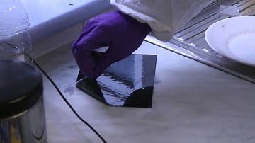 Forensic Science - dusting for footprints at a crime scene