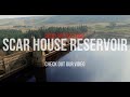 4k tourists enjoy a walk along scar house reservoir dam yorkshire england yorkshire scarhouse