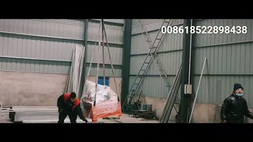 Loading machine into container Tee Grid FUT  Main T roll forming machine