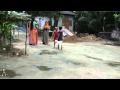 Little girl chases another girl for her goat in bangladesh village