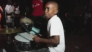 The 10-Year-Old Drummer From Jamaica Playing At His Mother Set Up