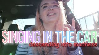 SINGING IN THE CAR (DESCENDING INTO MADNESS)
