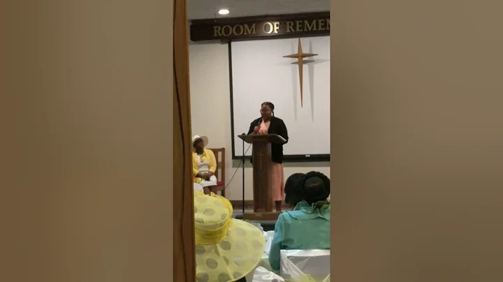 Janie sings at the Women's Month Tea Party