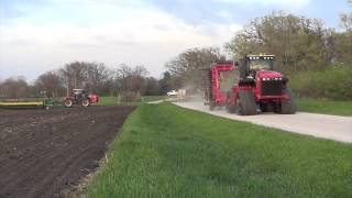 Planting Corn in Illinois with a Versatile 375 pulling a Deere DB90 planter.