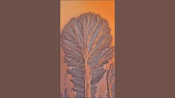 On the bank of the magnificent Qiantang River, the tidal trees are like a stroke of genius betwe