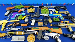 Colorful Toy Weapons - Gas Mask and Arcade Toy Guns - Shotgun Rifle and Pistols shorts ?