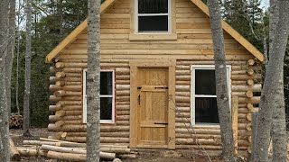 Building an off grid log cabin,working on the electrical on the second and first floor,woodwork.