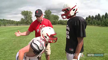 How do you do a tackle in football?