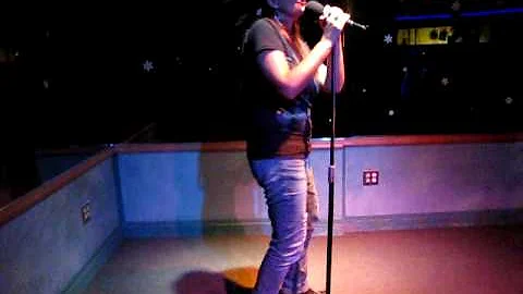 Debbie Coles singing "Son of a Preacher Man" at th...