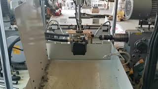 Fully automatic loading double head tapping machine