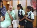 Women, children tie rakhi on Narendra Modi's wrist