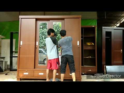 Video: Lemari Pakaian Geser Dengan Ceruk Untuk TV (49 Foto): Model Dengan Kabinet Atau Rak Built-in, Dengan TV Berengsel Di Tengah