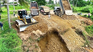 Nicely Activities New project Use SHANTUI Dozer & Many Dump Truck Unloading Stone Back Fill Big Pond