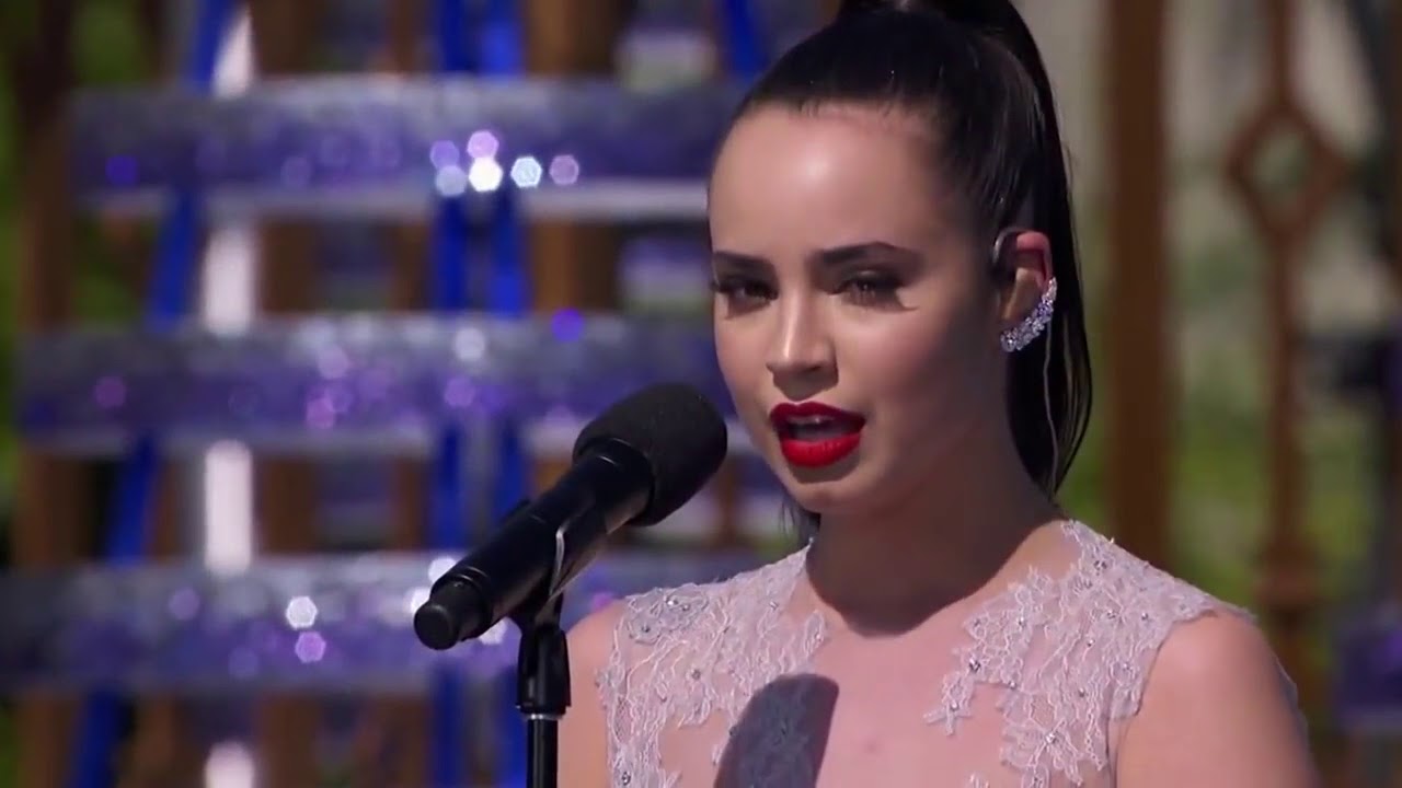 Sofia Carson perfoming Silent Night at Descendants Magical Holiday Celebration