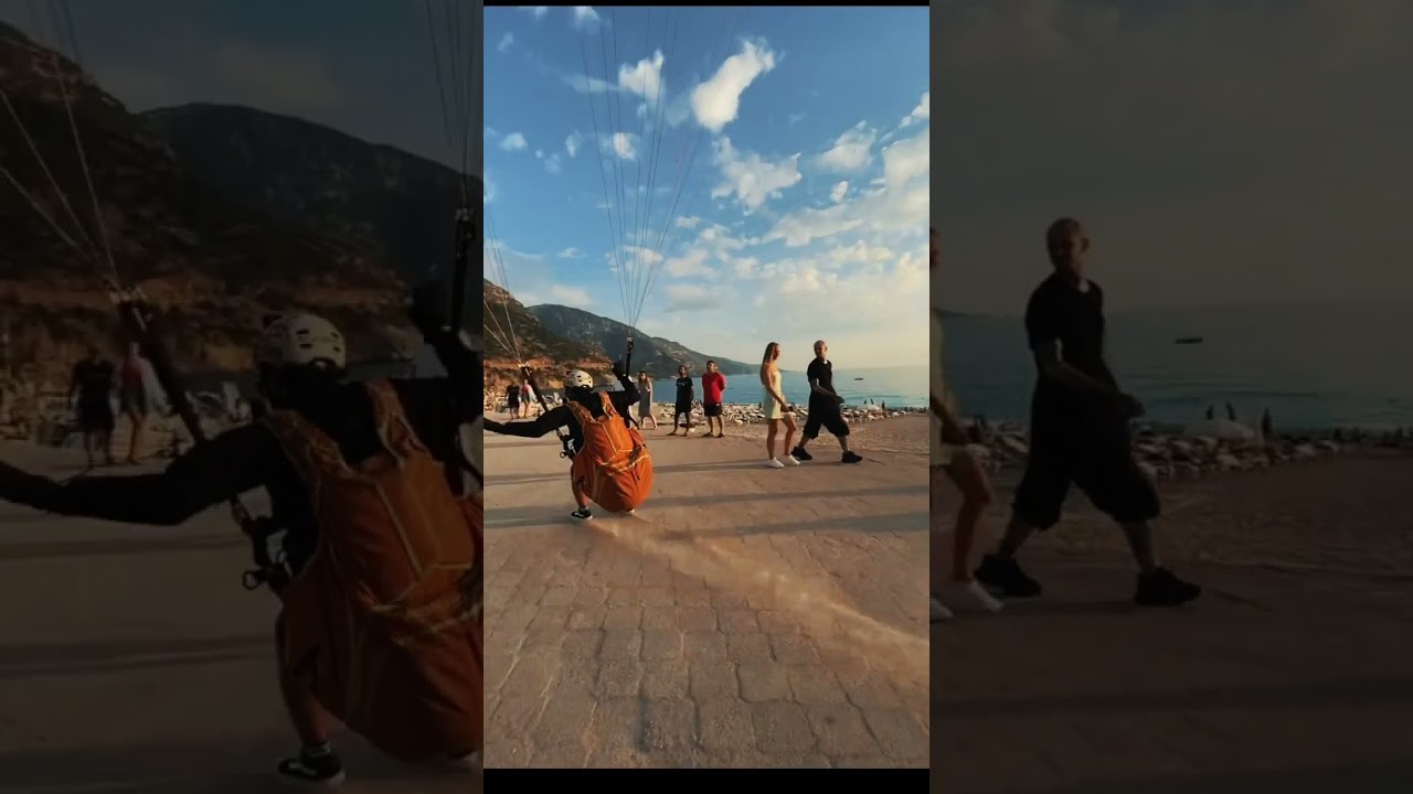 Paraglider Makes Smooth Landing Near Beach - 1277065-1