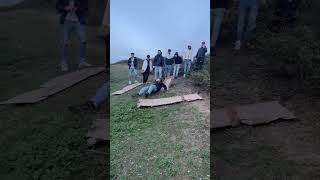 Boy Takes a Tumble in the Mud Causing Everyone to Laugh