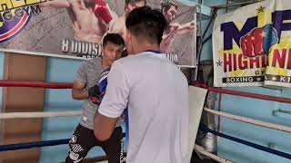 Wba Asia  Superflyweight Champion Adrian Lerasan  doing Mittwork with coach Richard Garcia