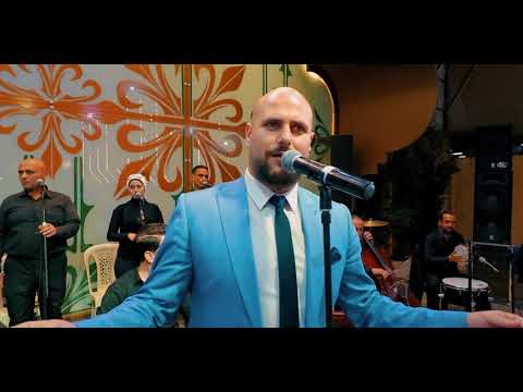 موشح حير الالباب جل من قد صورك فارس احمر