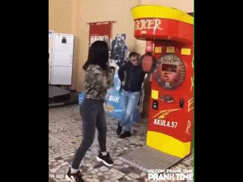 Woman hit man insanead of boxing machine