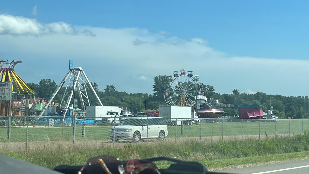 Passing the fairgrounds for the first time, seeing all the rides of how ...