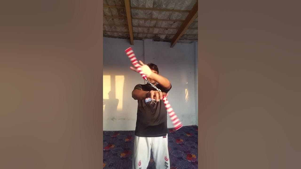 Learning Nunchaku Tricks with No Experience shorts YouTube