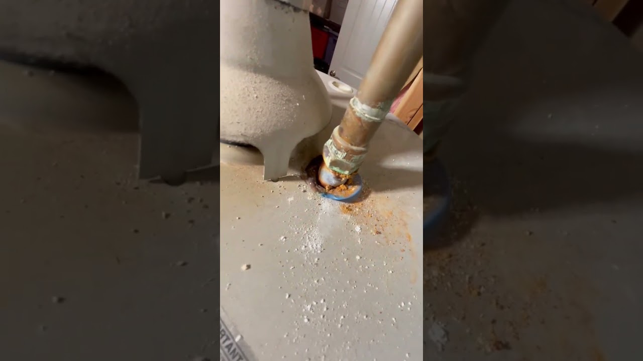 Backdrafting water heater from lack of makeup air. 