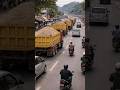 Sand Trucks Moving in Convoy Through Checkpoints