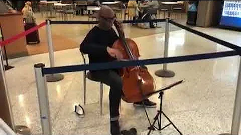 Dr Earnest Lamb plays at the Airport.