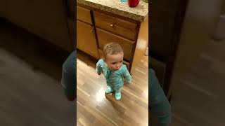 Kid gets cheese thrown at him in his onesie