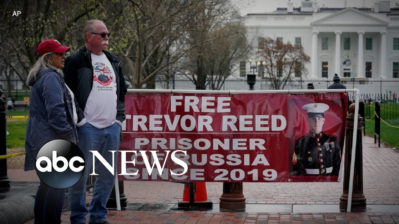 Parents of ex-Marine detained in Russia protest at White House