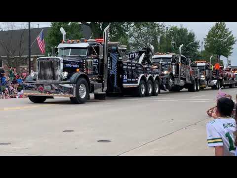 Local Tow Truck company towing their own tow trucks