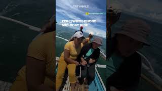 Fish Plunges Into Boat, Es Womans Phone