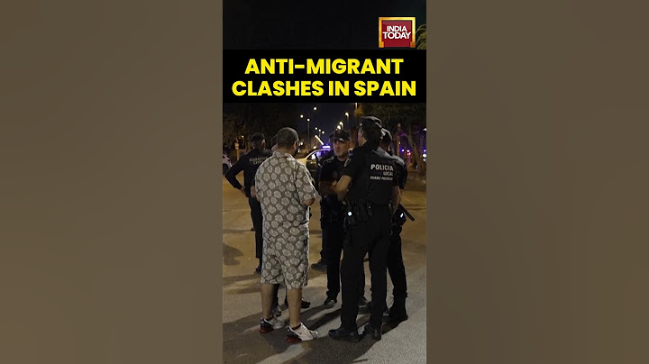 Anti-Migrant Groups Clash With Riot Police in Southeastern Spain | Far-Right Protest Turns Violent