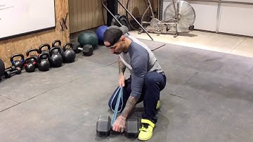 Banded Single Arm Dumbbell Row