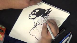 Adam Hughes drawing Batgirl