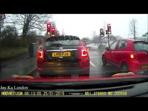 Shocking moment emergency vehicle on 999 call "jumps red" and is hit by motorist