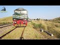 Green line 6dn crossing tezgam at kaluwal station in mountains pakistan railways