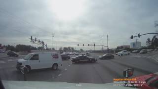 Clayton County Sheriff's Vehicle Uses Lights & Siren To Get Through The Intersection