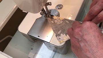 AccuQuilt - Stitching Half Square Triangles