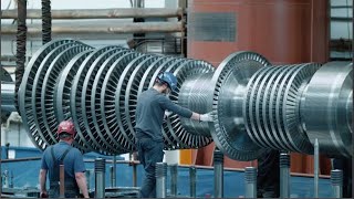 Giant Generator Production Process At SIEMENS Factory. The world's largest compressor manufacturer.