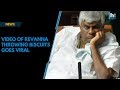 Viral video: Minister HD Revanna throwing biscuits at flood victims