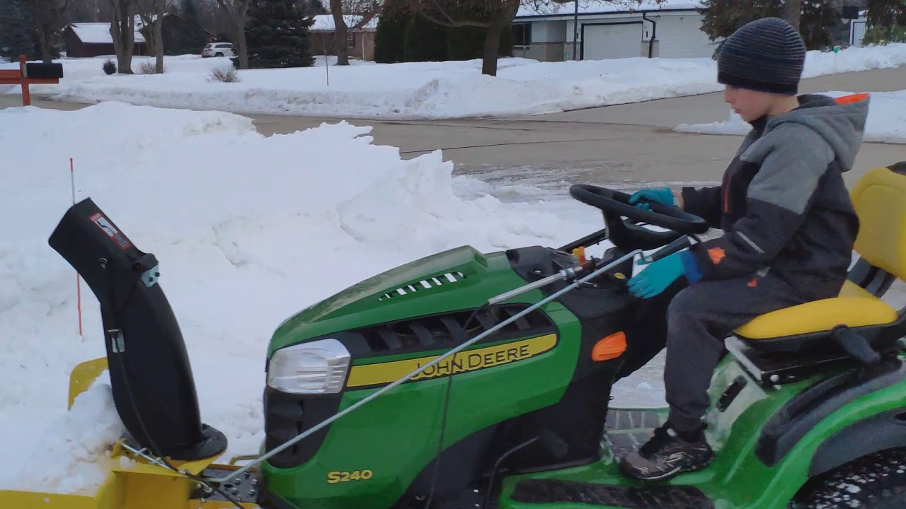 John Deere S240 with a snow blower attachment. - YouTube