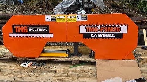 Cutting wood on The TMG PSM26 sawmill and closing up wood fired sauna cold start diesel