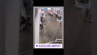 only in new zealand does flooding get explained with a wet floor sign! #aucklandairport
